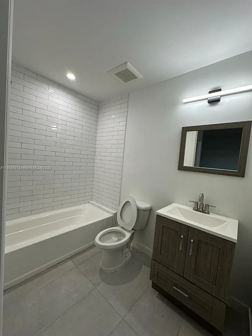 Bathroom with subway tile and modern fixtures